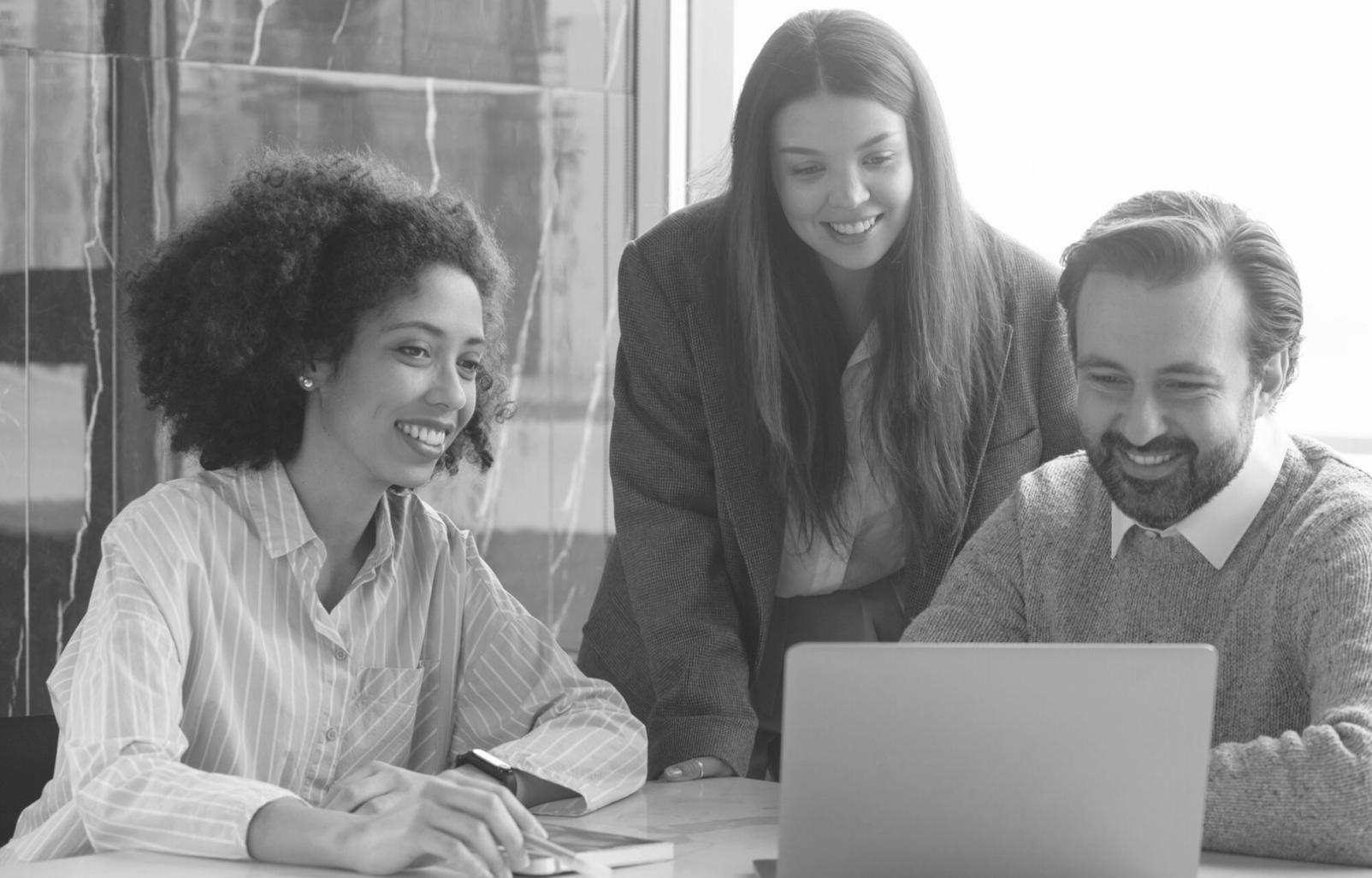 Professional color grading workspace showing multiple monitors displaying video footage in various stages of color correction